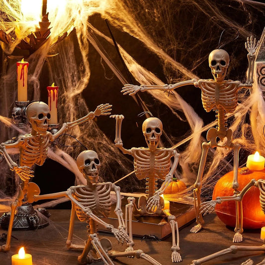 Bone Crew posable skeletons set up in a haunted Halloween scene